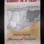 CAUGHT IN A TRAP: ISSUES IN NIGERIAN DEMOCRACY AND DEVELOPMENT
