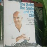 THE SAINT, THE SURFER, AND THE CEO